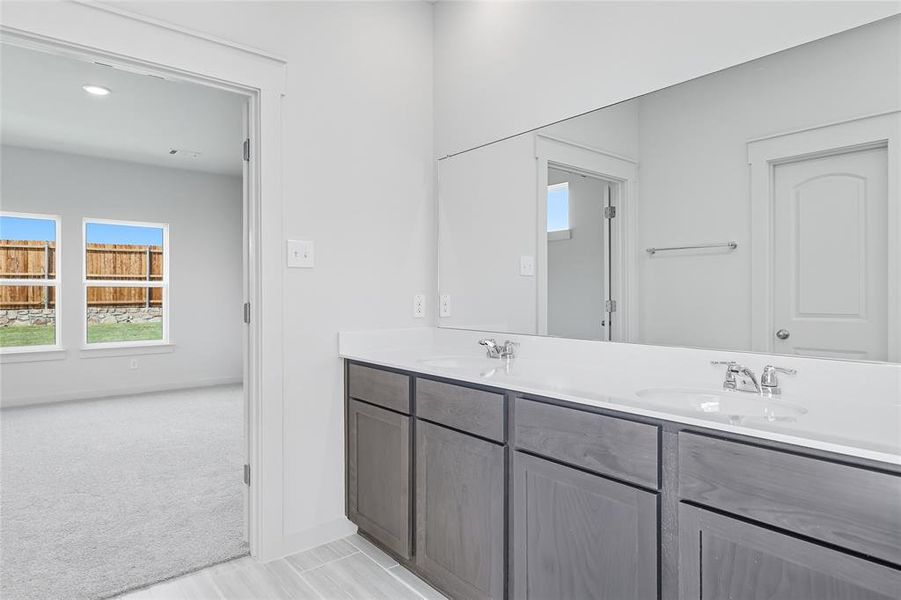 Bathroom with double vanity and recessed lighting Bathroom with double vanity and recessed lighting