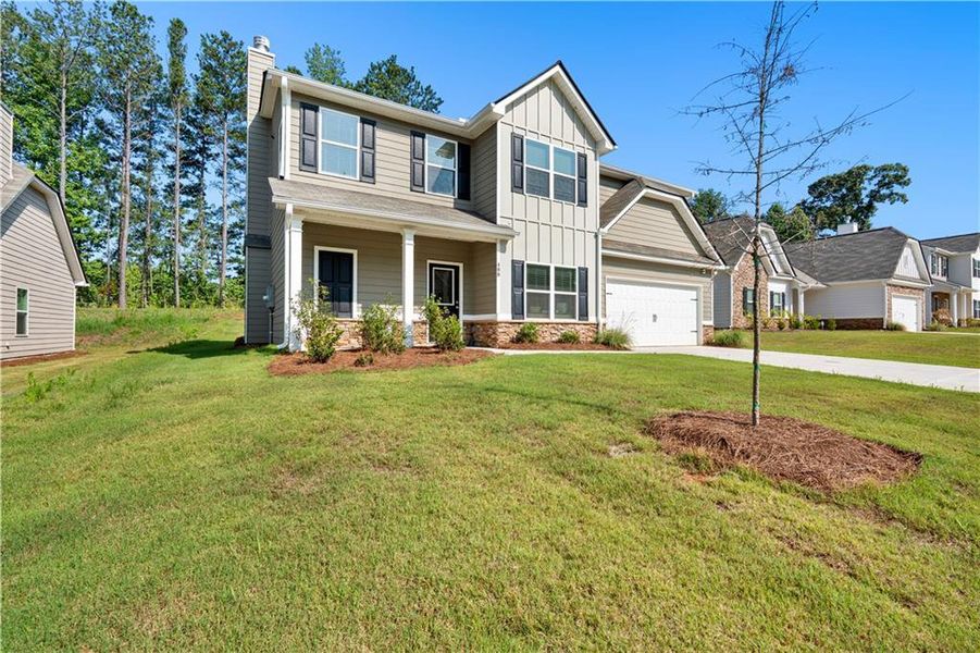 Front exterior of a new home in , Villa Rica, GA, highlighting curb appeal (Image 27). Front exterior of a new home in , Villa Rica, GA, highlighting curb appeal (Image 27).