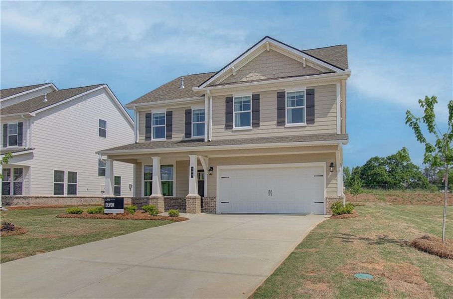 Front exterior of a new home in Cooper Park, McDonough, GA, highlighting curb appeal (Image 14).
