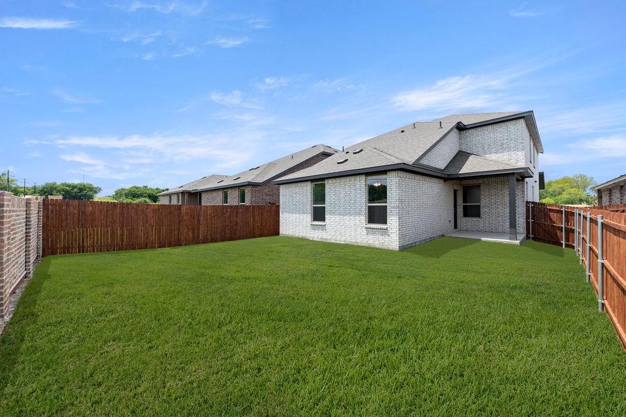 Front exterior of a new home in Churchill, Anna, TX, highlighting curb appeal (Image 24). Front exterior of a new home in Churchill, Anna, TX, highlighting curb appeal (Image 24).