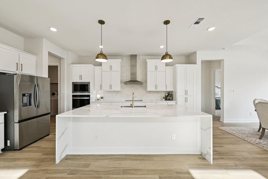 Furnished interior view inside a new home in Elyson, Katy (Image 37).