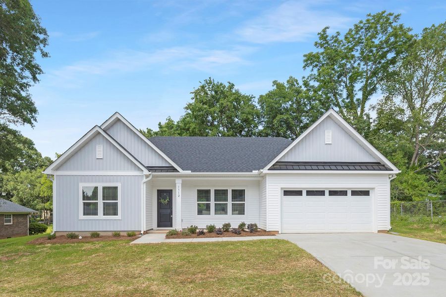 Front exterior of a new home in , Salisbury, NC, highlighting curb appeal (Image 1).