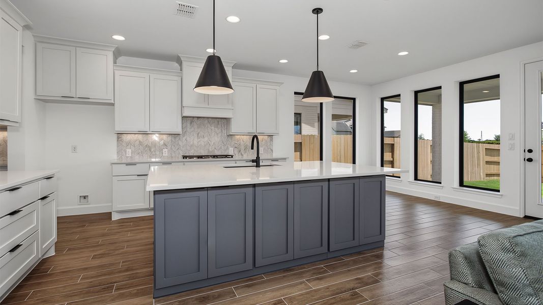Furnished interior view inside a new home in Lakes of Cane Island, Katy (Image 4).