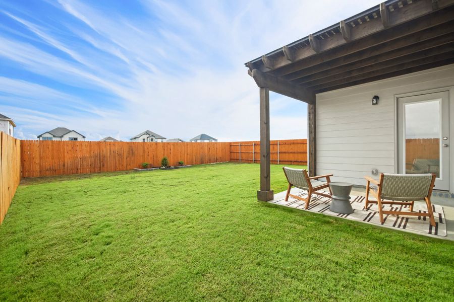 Patio in the Diamond home plan by Trophy Signature Homes – REPRESENTATIVE PHOTO