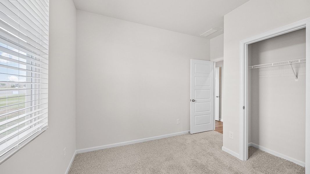 Spacious, unfurnished interior of a new home in Remington Chase, Perry (Image 21).