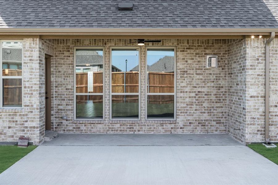 Exterior details and patio area of a home in Stone River Glen 60s, Royse City (Image 26). Exterior details and patio area of a home in Stone River Glen 60s, Royse City (Image 26).