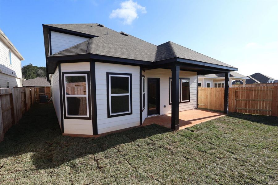 Exterior details and patio area of a home in Lone Star Landing, Montgomery (Image 21).