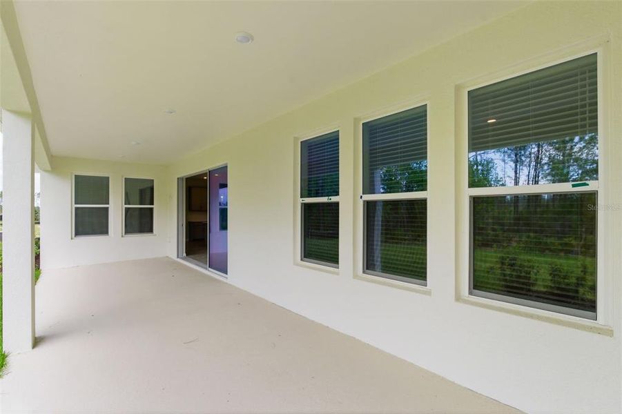 Exterior details and patio area of a home in Hammock at Two Rivers, Zephyrhills (Image 34).