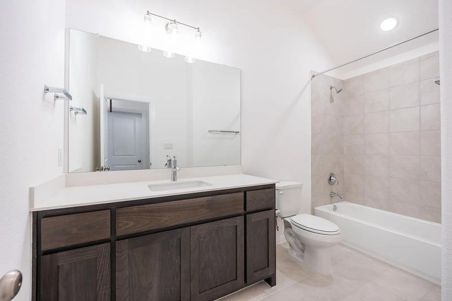 Furnished interior view inside a new home in Caliterra - 70', Dripping Springs (Image 7). Furnished interior view inside a new home in Caliterra - 70', Dripping Springs (Image 7).