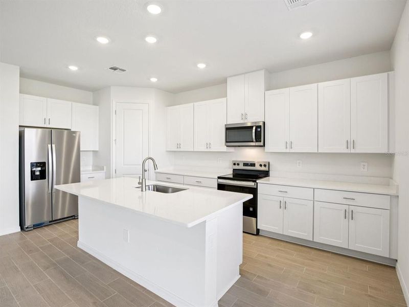 Furnished interior view inside a new home in Coasterra - Reserve Series, Palmetto (Image 7).