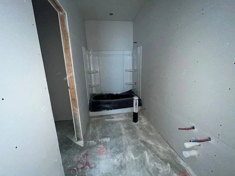 In-progress construction of a new home in Lariat, Liberty Hill, TX (Image 15).