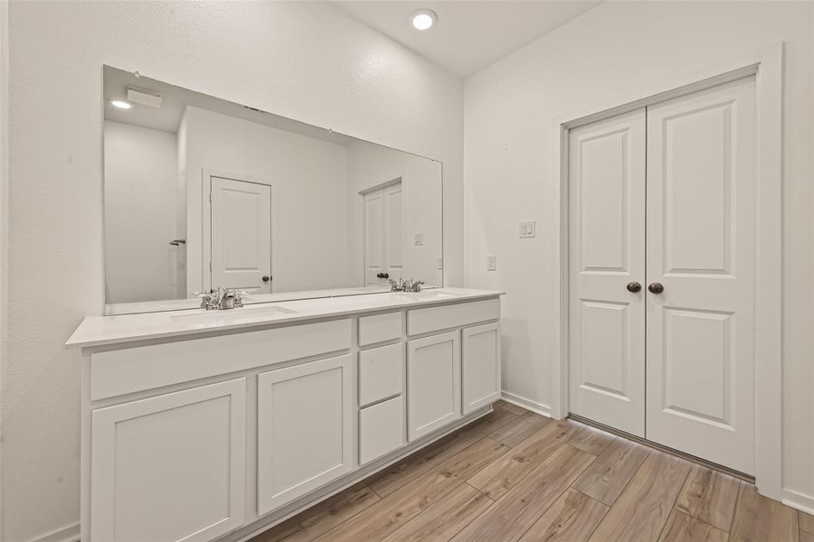 Furnished interior view inside a new home in Sunterra, Katy (Image 9).