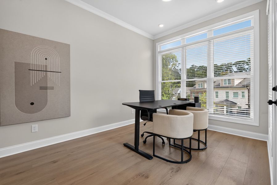 Representative furnished interior of a home built from the The Benton IV by The Providence Group in Ward's Crossing Townhomes, Johns Creek (Image 29).
