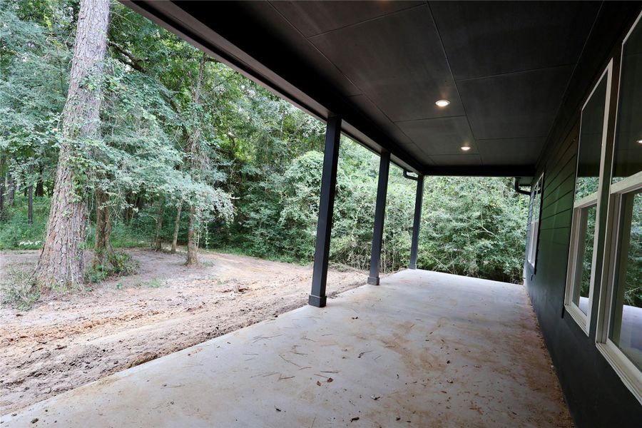 Exterior details and patio area of a home in , Magnolia (Image 7). Exterior details and patio area of a home in , Magnolia (Image 7).