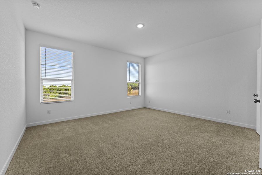 Spacious, unfurnished interior of a new home in Waterwheel: Coastline Collection, San Antonio (Image 18).