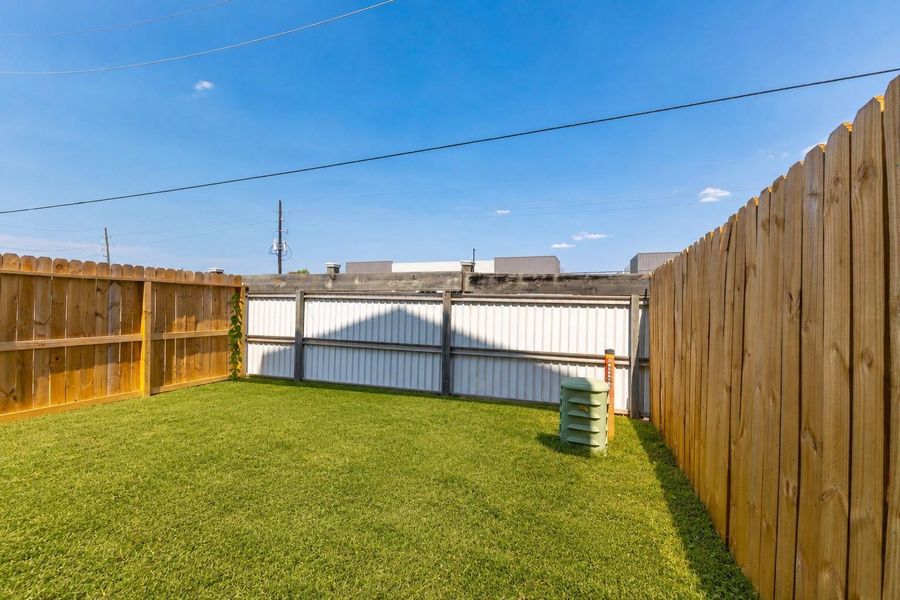 Exterior details and patio area of a home in , Spring (Image 4).
