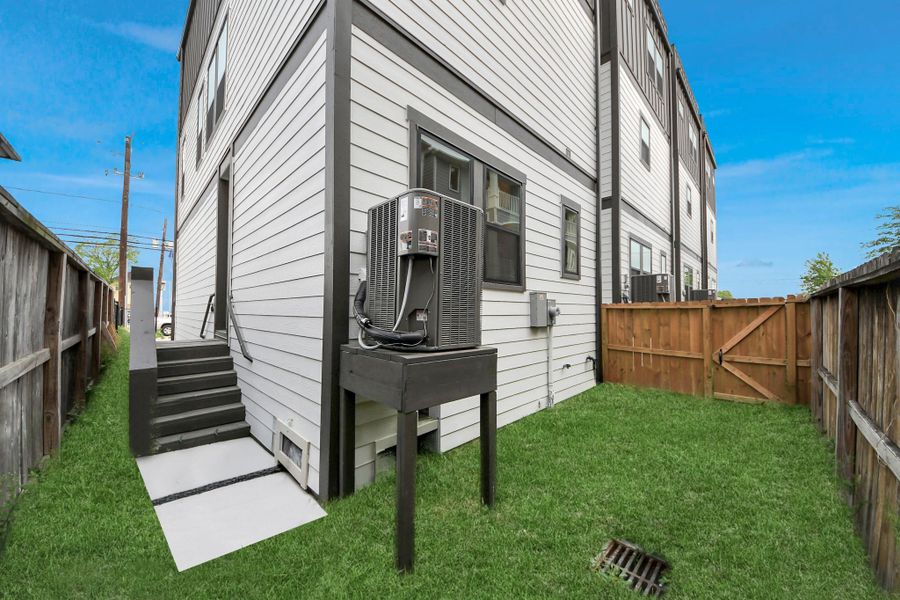 Exterior details and patio area of a home in , Houston (Image 3).