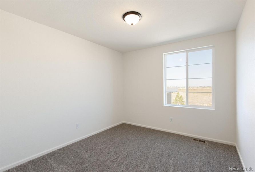 Spacious, unfurnished interior of a new home in Legato, Commerce City (Image 31).