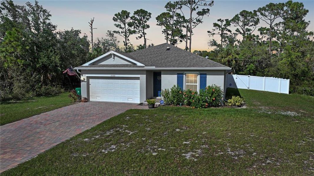Front exterior of a new home in , Port Charlotte, FL, highlighting curb appeal (Image 24). Front exterior of a new home in , Port Charlotte, FL, highlighting curb appeal (Image 24).