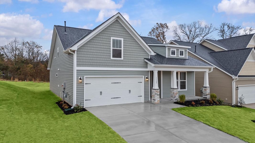 Front exterior of a new home in Iris Meadows, Moore, SC, highlighting curb appeal (Image 2).