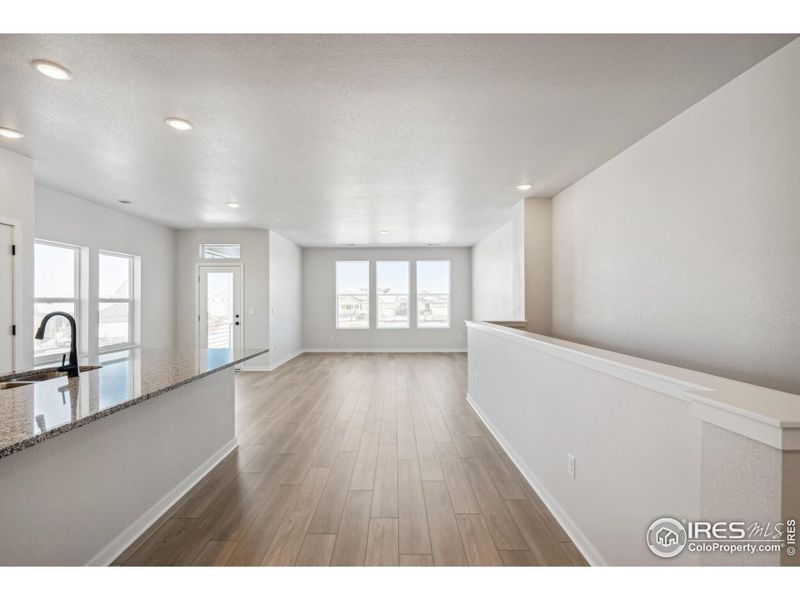 Spacious, unfurnished interior of a new home in Kinston Mainstreet Townhomes, Loveland (Image 23).