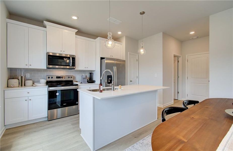 Furnished interior view inside a new home in Enclave at Evergreen, Fairburn (Image 12).