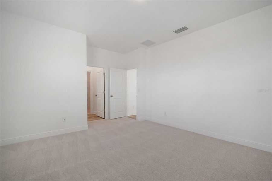 Spacious, unfurnished interior of a new home in North River Ranch, Parrish (Image 24).