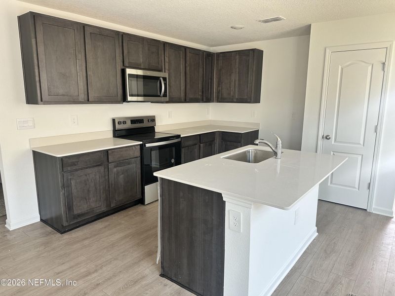 Furnished interior view inside a new home in Rookery, Green Cove Springs (Image 5). Furnished interior view inside a new home in Rookery, Green Cove Springs (Image 5).
