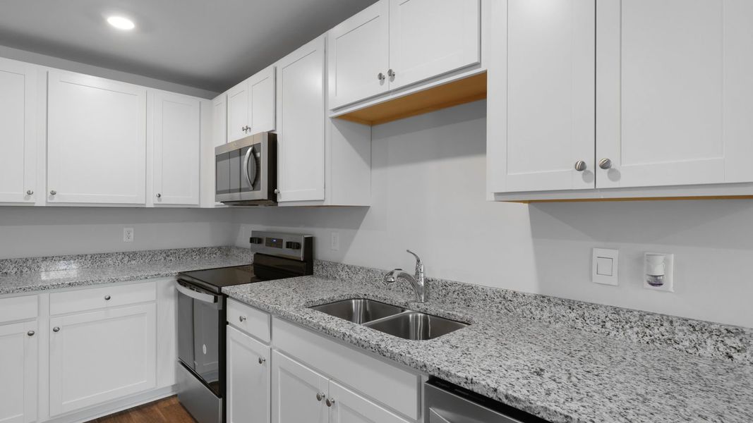 Representative furnished interior of a home built from the SULLIVAN by D.R. Horton in Evergreen, Holly Hill (Image 6).