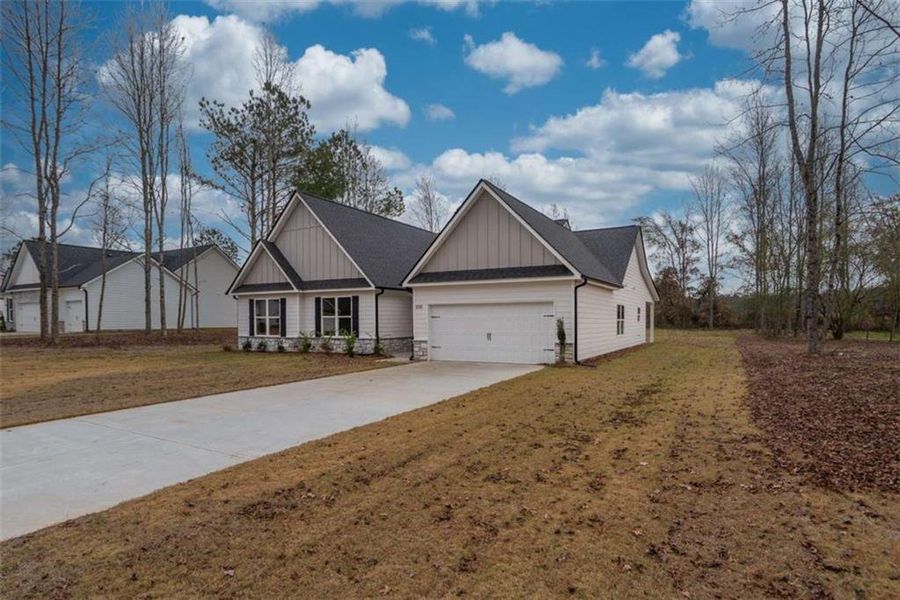 Front exterior of a new home in , Good Hope, GA, highlighting curb appeal (Image 20).