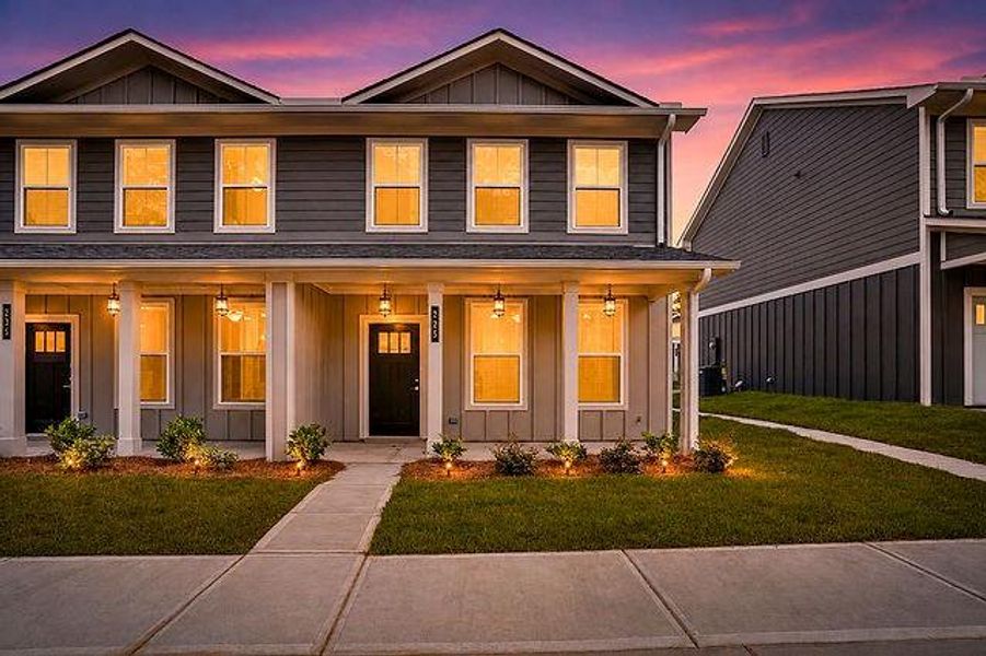 Front exterior of a new home in The Cottages at East Lanier, Fayetteville, GA, highlighting curb appeal (Image 13).