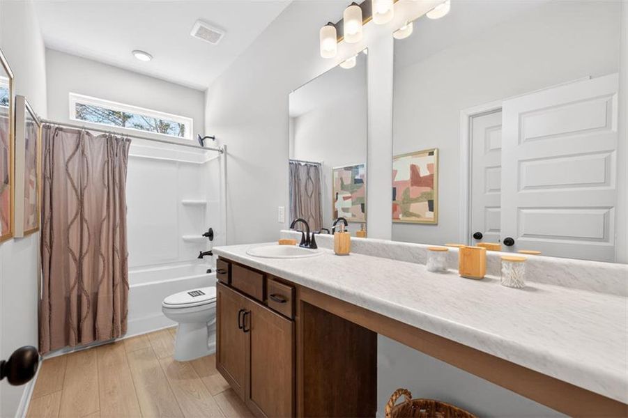 Furnished interior view inside a new home in Saddle Ridge, Calhoun (Image 28).