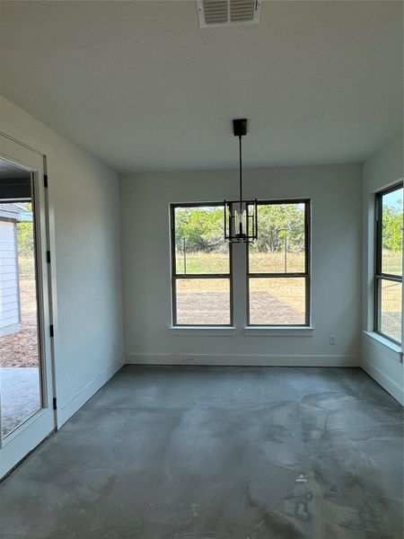 Dining Area with Outdoor Access to Rear Covered Patio