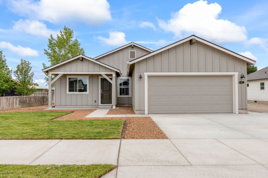 Front exterior of a new home in Willowbrook, Madras, OR, highlighting curb appeal (Image 2). Front exterior of a new home in Willowbrook, Madras, OR, highlighting curb appeal (Image 2).