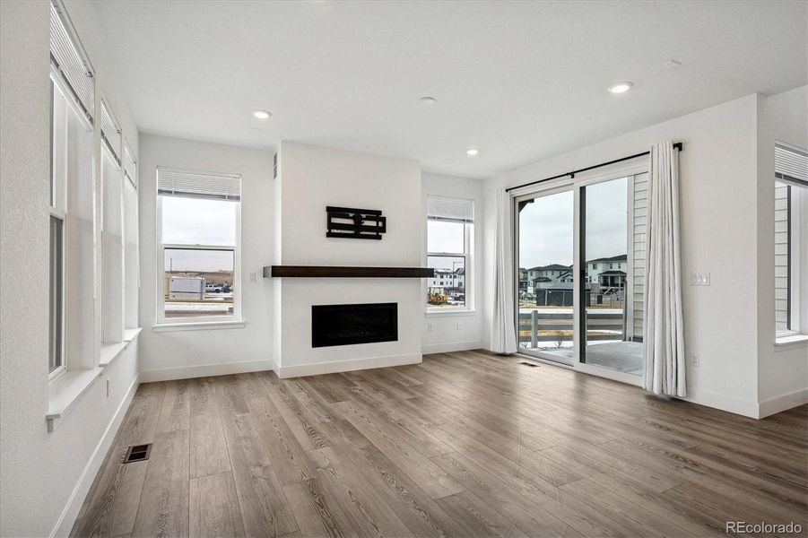 Living room opens to the low-maintenance patio; bright and sunny Living room opens to the low-maintenance patio; bright and sunny