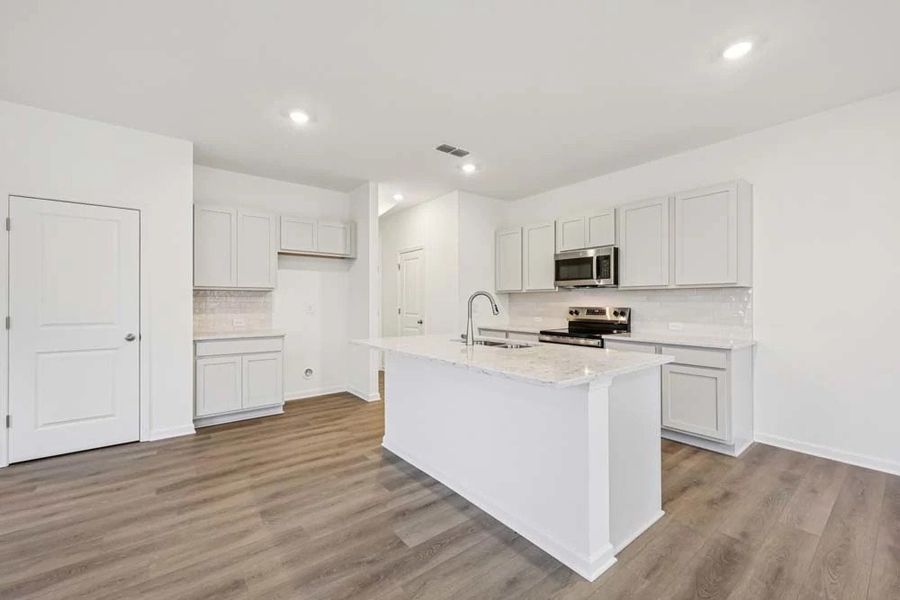 Kitchen featuring Milan Collection Finishes