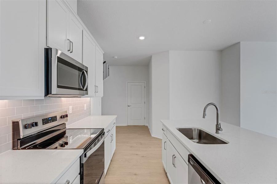 Furnished interior view inside a new home in Seaire, Parrish (Image 8).