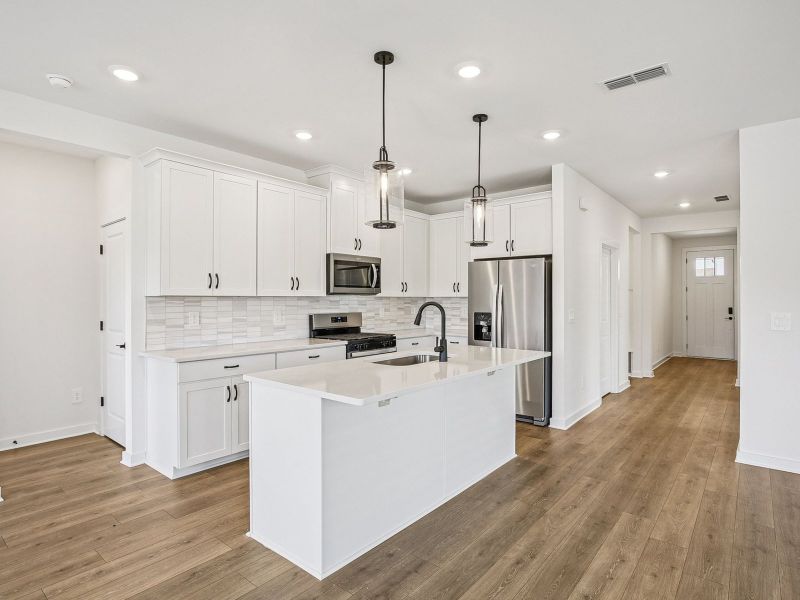 Prep dinner in the kitchen without missing the conversation in the great room.