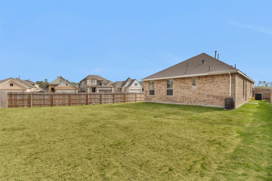 Exterior details and patio area of a home in Artavia: Avante Collection, Conroe (Image 22).