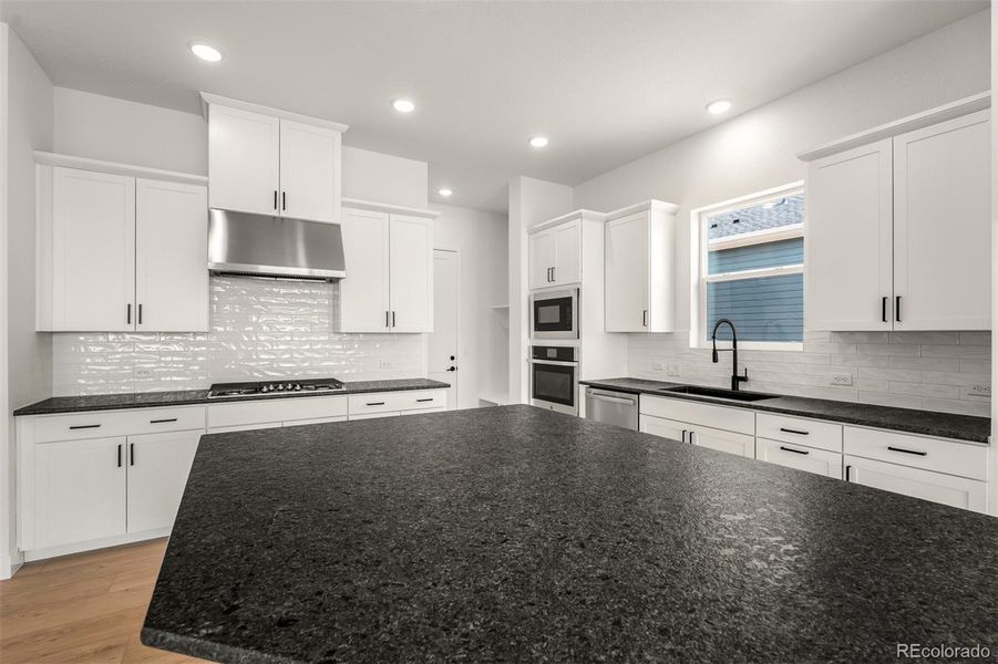 Furnished interior view inside a new home in Wolf Ranch - Enclave Collection, Colorado Springs (Image 8).