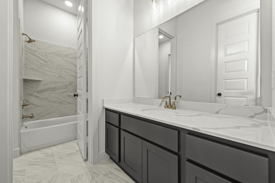 Representative furnished interior of a home built from the The Oakville by Westin Homes in The Woodlands Hills, Willis (Image 10).