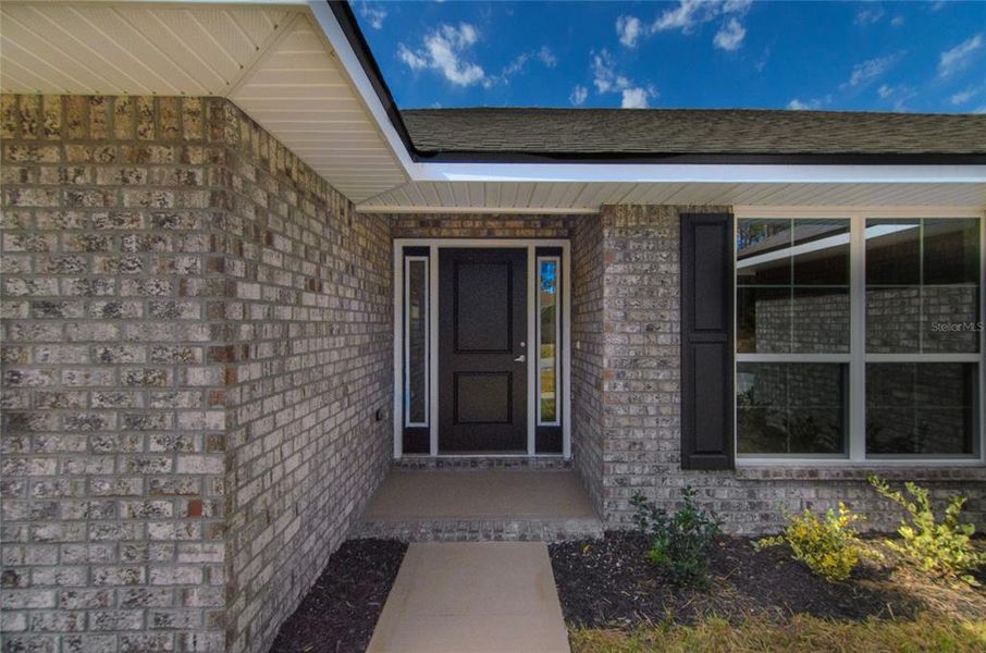 Exterior details and patio area of a home in Palm Coast, Palm Coast (Image 3).