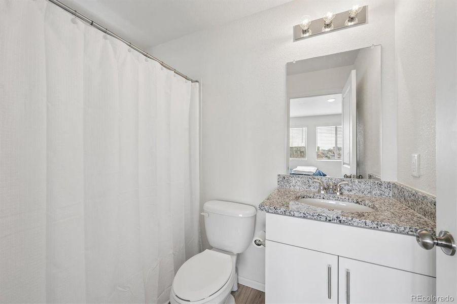 Furnished interior view inside a new home in Reunion, Commerce City (Image 12).