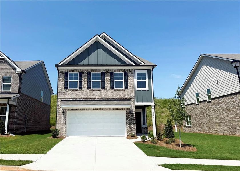 Front exterior of a new home in Alcovy Village, Lawrenceville, GA, highlighting curb appeal (Image 1). Front exterior of a new home in Alcovy Village, Lawrenceville, GA, highlighting curb appeal (Image 1).