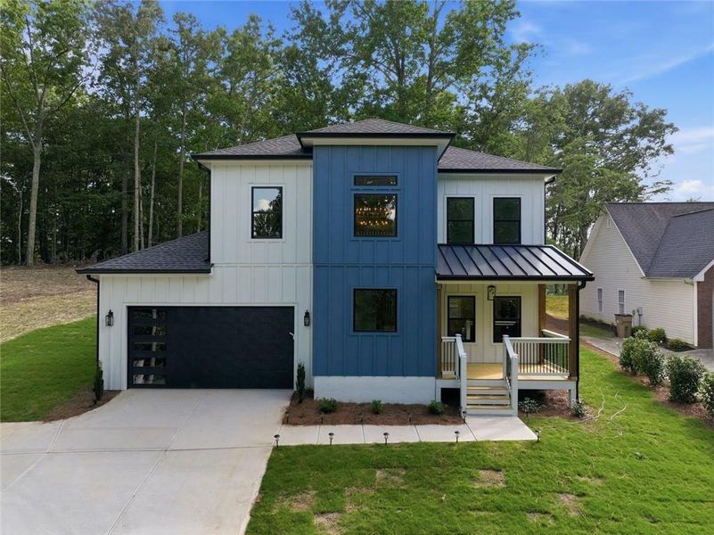 Front exterior of a new home in , Gainesville, GA, highlighting curb appeal (Image 21).