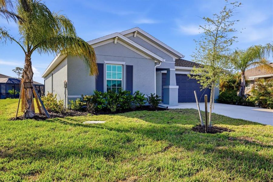 Front exterior of a new home in Rotonda Lakes, Rotonda West, FL, highlighting curb appeal (Image 20).