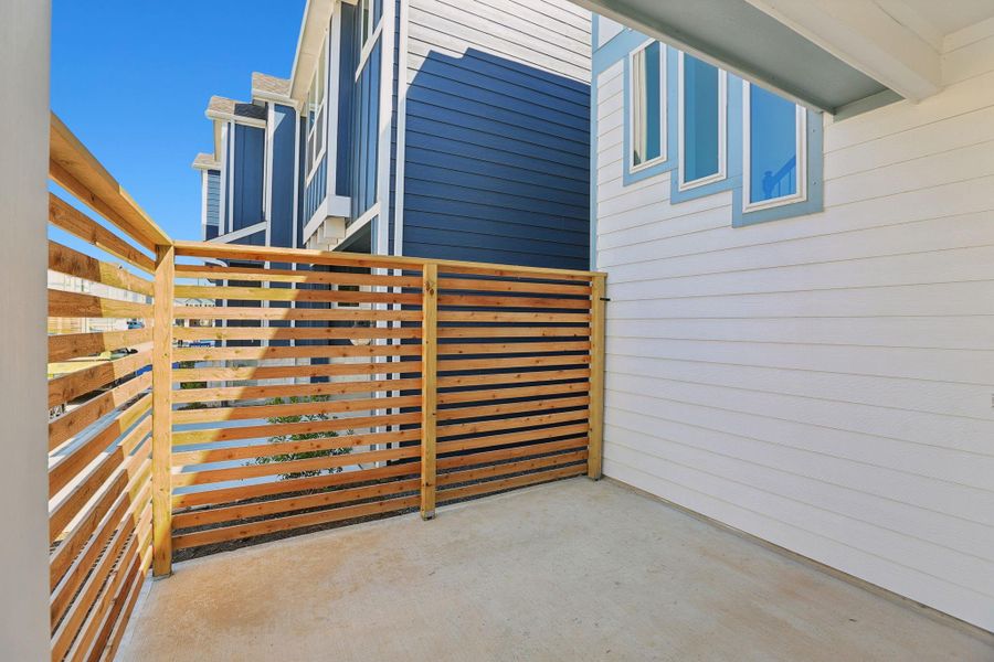 Exterior details and patio area of a home in Kemah Crossing - Luxe Series, Kemah (Image 28). Exterior details and patio area of a home in Kemah Crossing - Luxe Series, Kemah (Image 28).