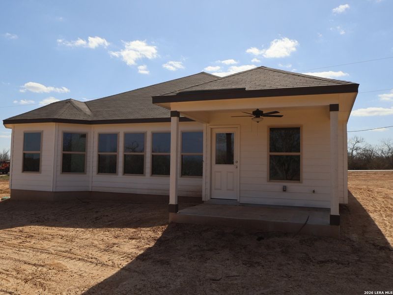 Exterior details and patio area of a home in Chaparral Ranch, Floresville (Image 22).