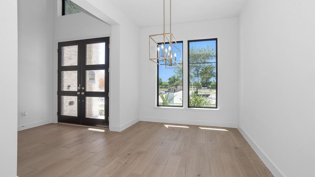 Spacious, unfurnished interior of a new home in Lakes of Cane Island, Katy (Image 11).