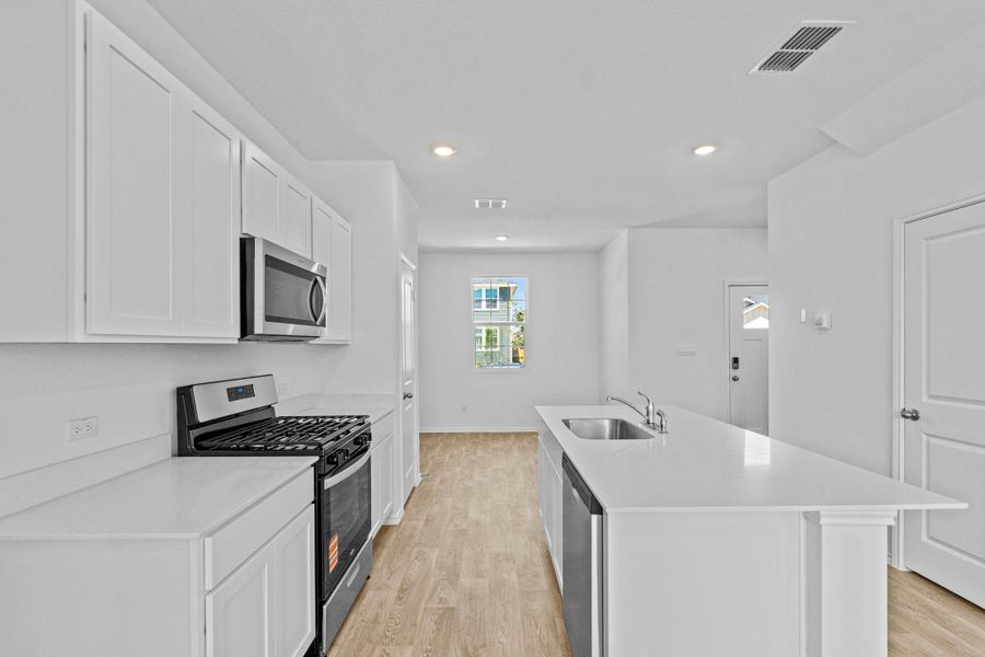 Furnished interior view inside a new home in Valverde, Bastrop (Image 8).